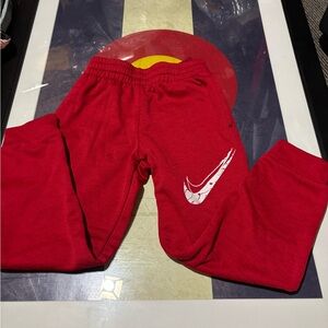 Nike Kids Red Sweatpants with White Swoosh Logo